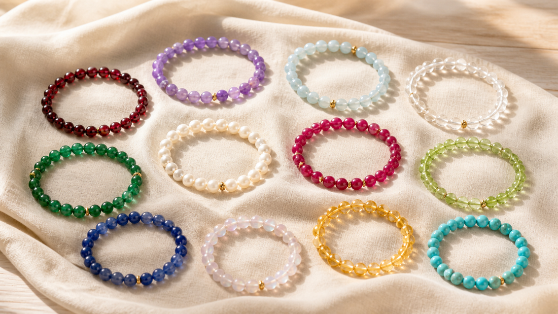Twelve colorful gemstone bead bracelets representing January through December birthstones