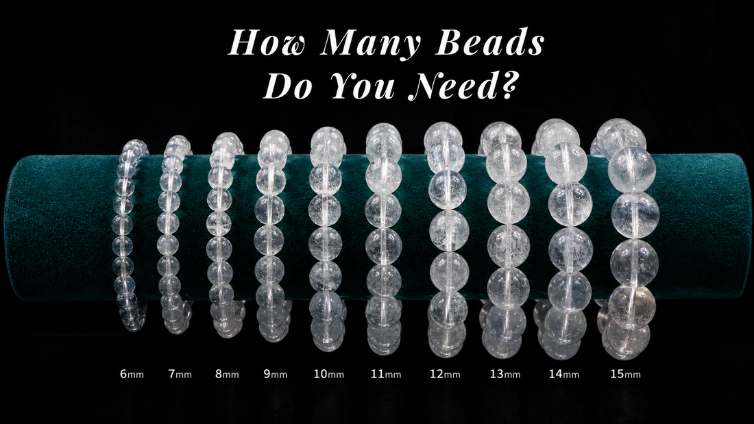 Ten clear quartz bracelets arranged from 6mm to 15mm bead sizes on a teal velvet display
