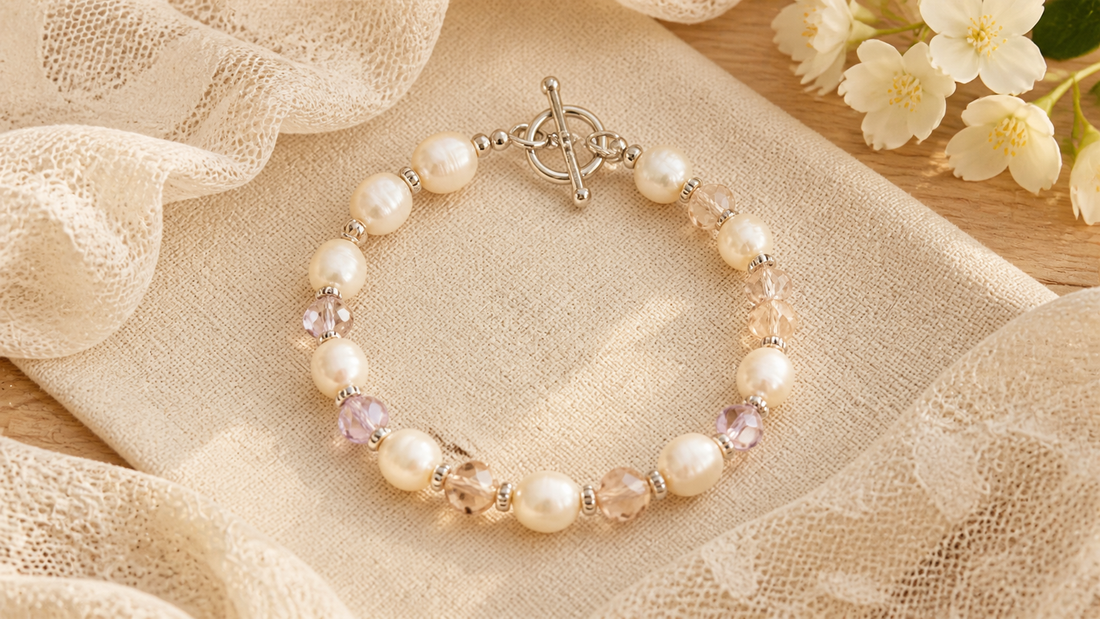 Freshwater pearl and faceted crystal bracelet with silver toggle clasp on ivory linen and lace