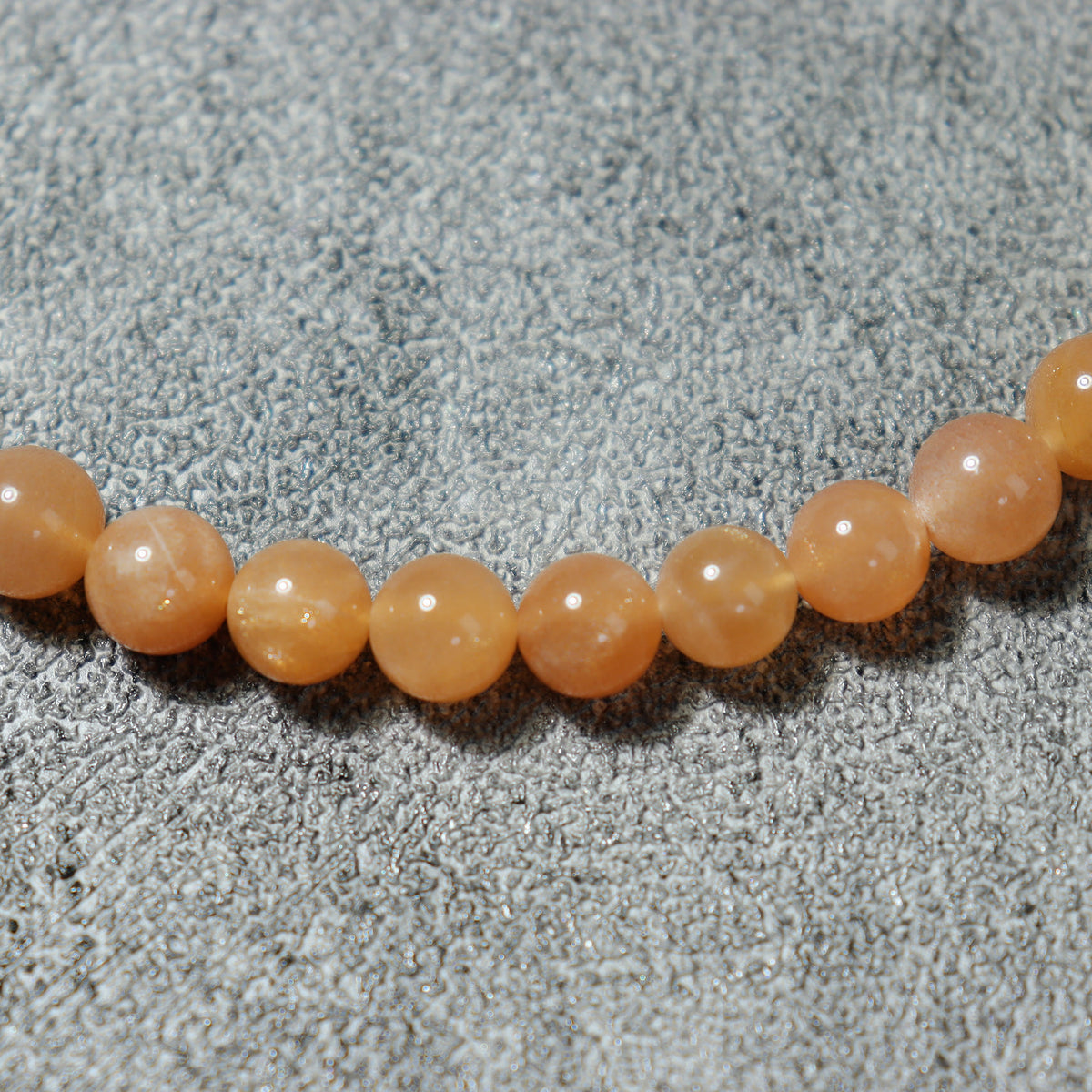 Sunset Arrow Layered Bracelet — peach bead strand detail